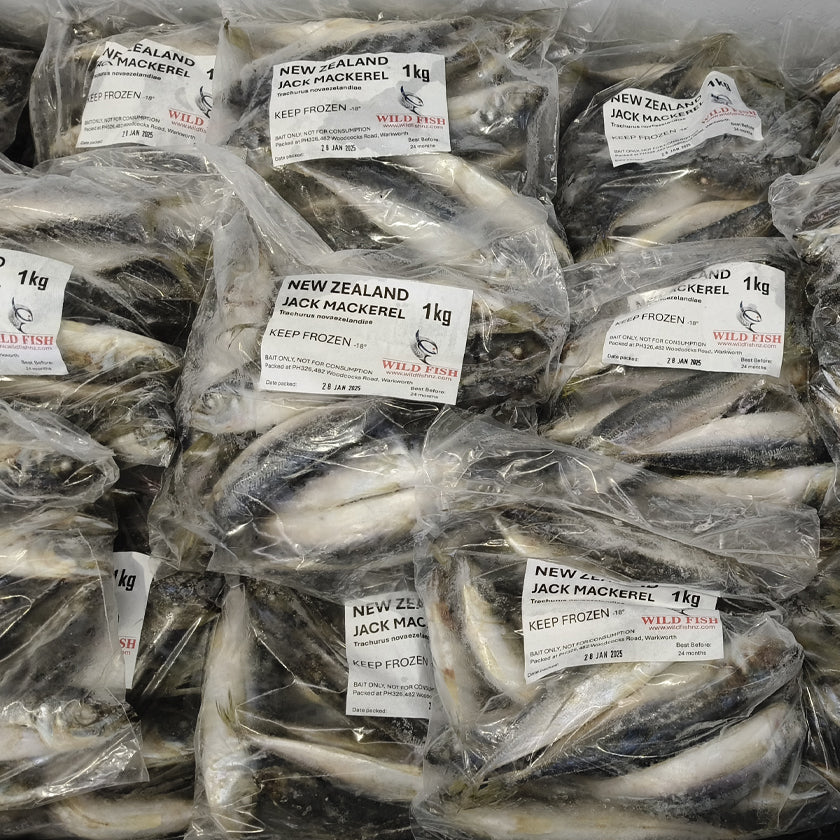 1KG bags of New Zealand premium-grade frozen Jack Mackerel bait, with fresh mackerel displayed on a plate, snap-frozen for top fishing performance.