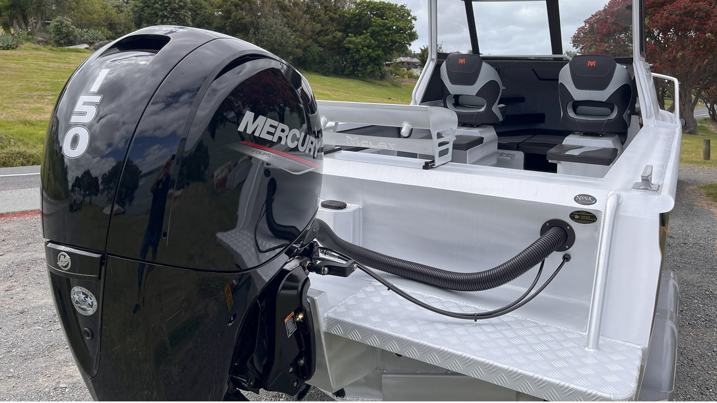 McLay 651 Sportsman alloy boat on trailer, featuring hard top and Mercury outboard at Warren Hay Marine. Whangarei
