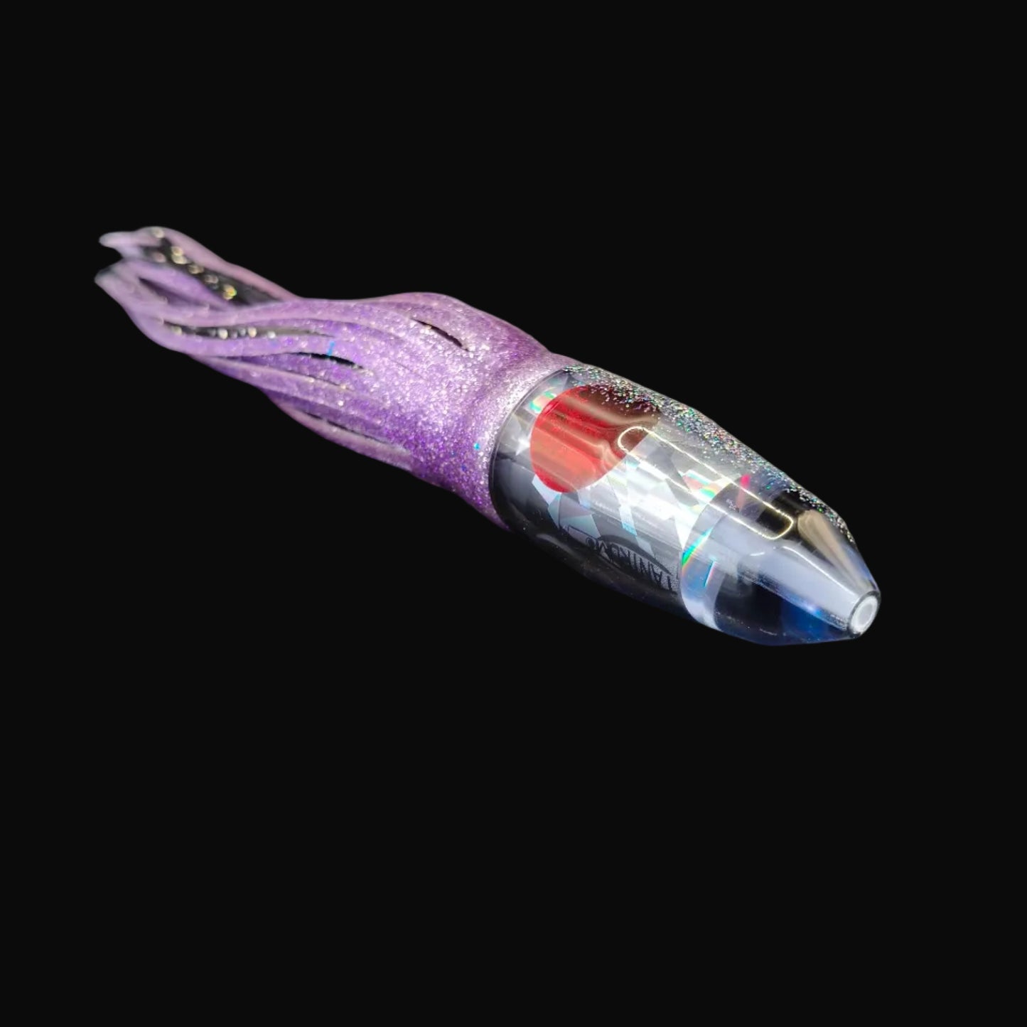 Tantrum Small Bullet lure with charcoal head and purple, black, and blue ocean skirts, 225mm trolling lure.