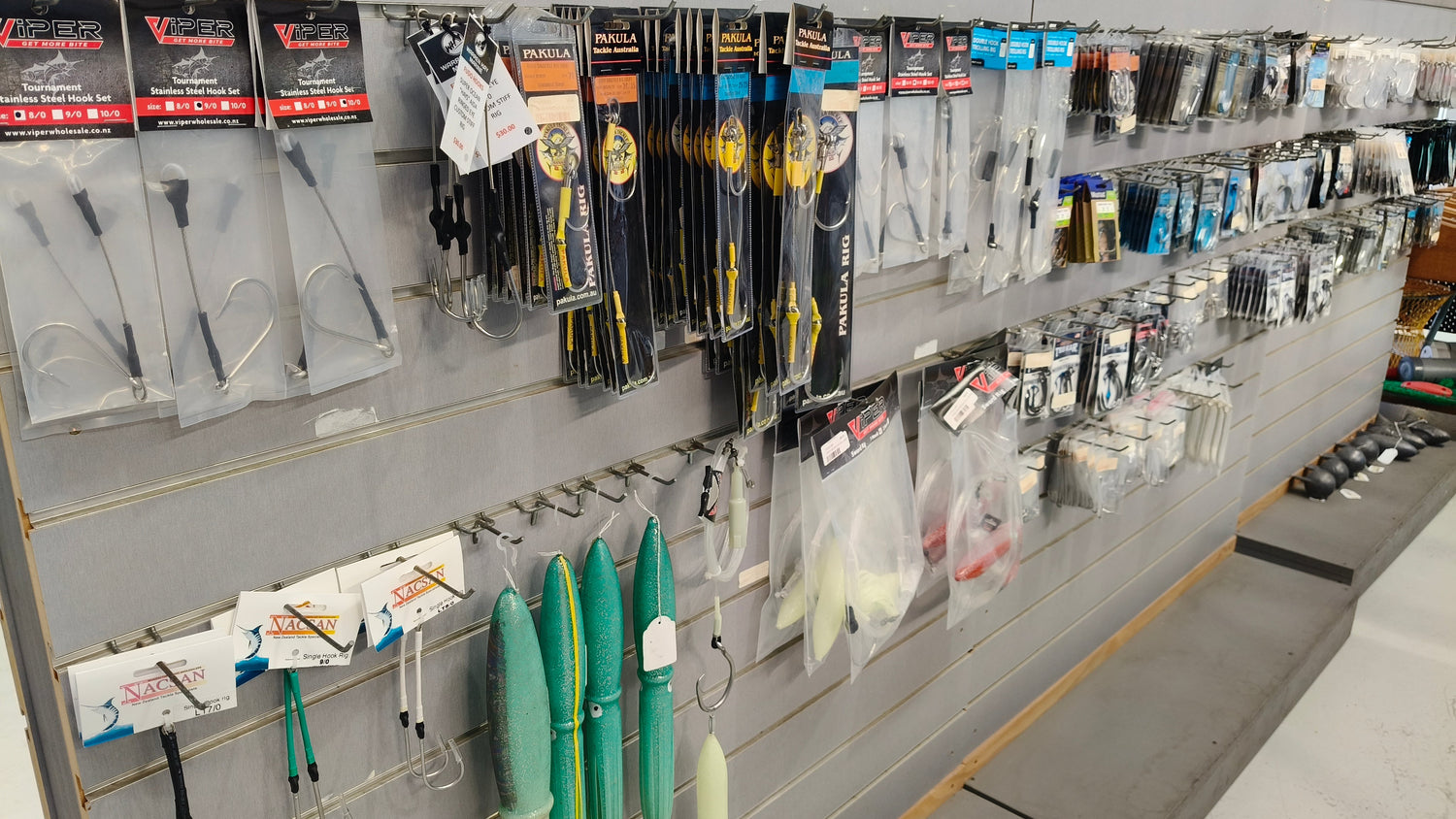 NZ game fishing accessories display: offshore gear, rigging, leaders, hooks, dredges, teasers, and terminal tackle.