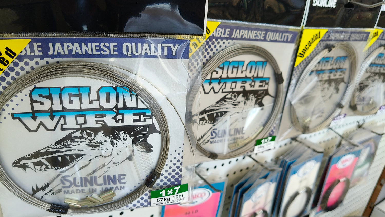 Coiled fishing wire leaders on display; Siglon Wire by Sunline, 57kg 10m, Japanese quality