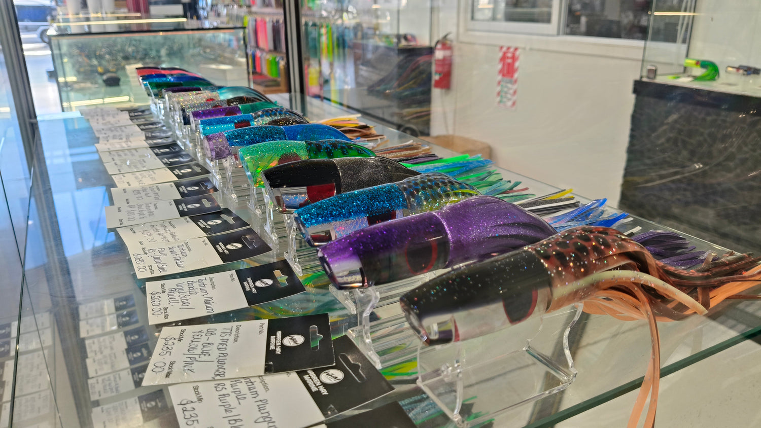 Assorted glittery game fishing lures on display at Warren Hay Marine NZ