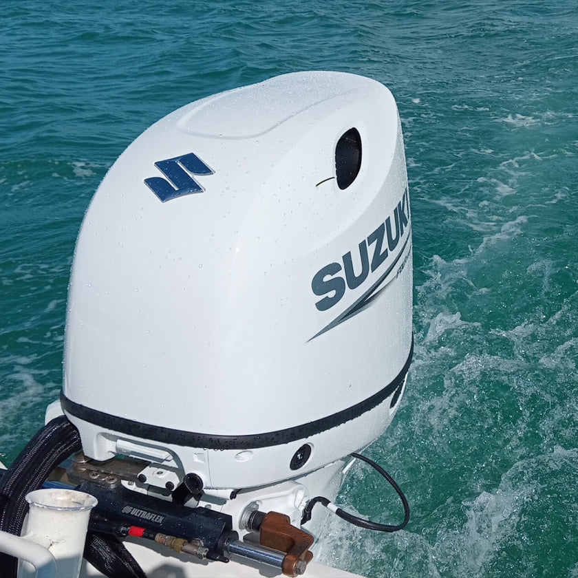 Range of Suzuki 40–350HP 4-stroke outboard motors at Warren Hay Marine Whangārei, built for power, performance, and reliability