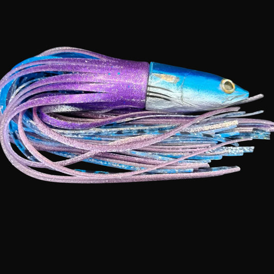 Aliʻi Kai AKU 9 inch game fishing lure with purple head skirted in blue and black Blue Ocean skirts