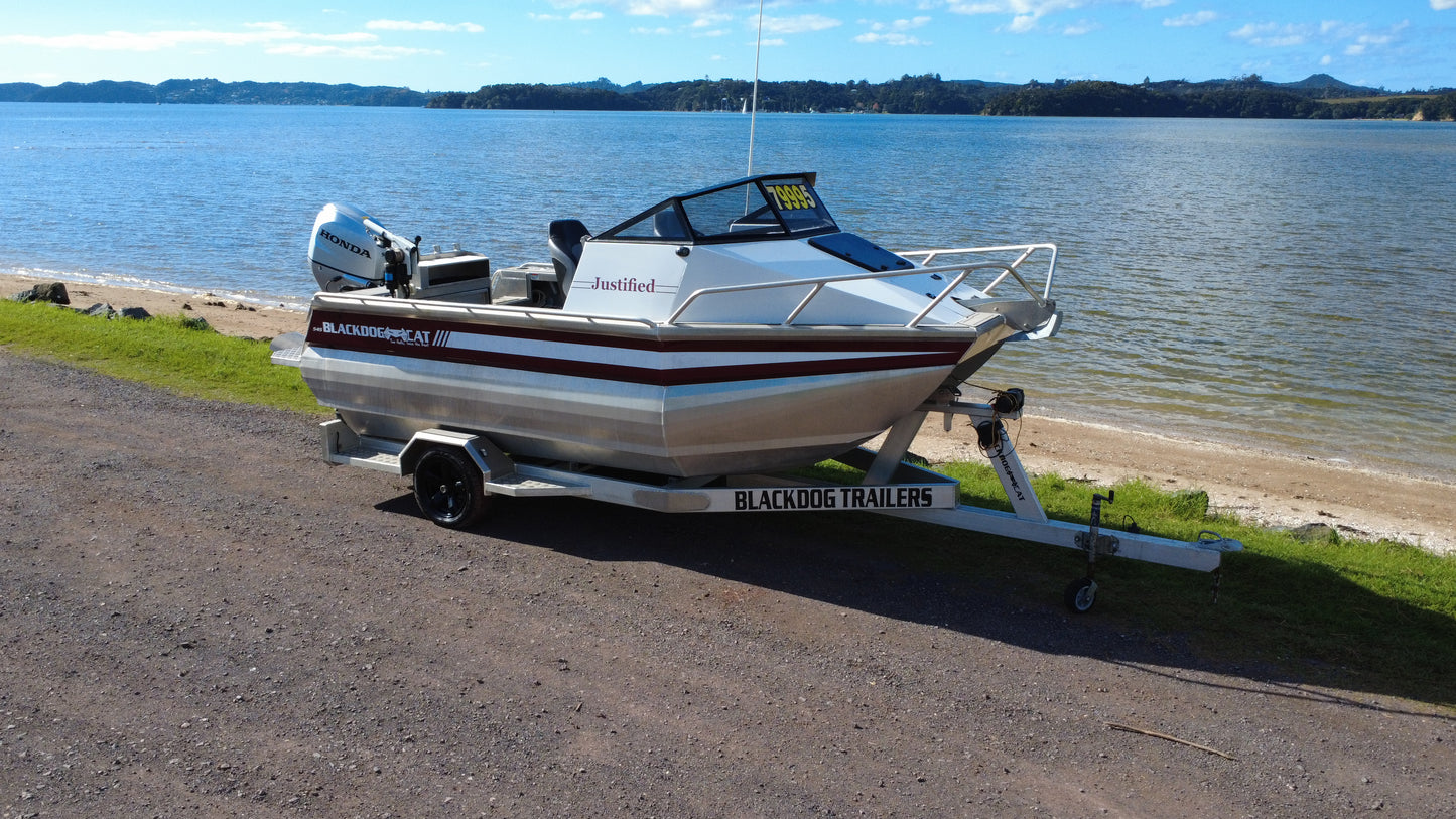 Used Black Dog 545 for sale, Warren Hay Marine, Whangarei. Honda Outboard