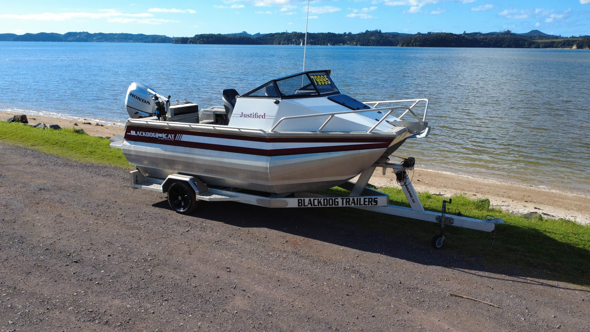 Used Black Dog 545 for sale, Warren Hay Marine, Whangarei. Honda Outboard