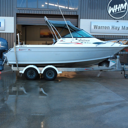 2005 Lazercraft 621XP aluminium hardtop fishing boat with Yamaha F150 FourStroke on tandem axle trailer outside Warren Hay Marine.
