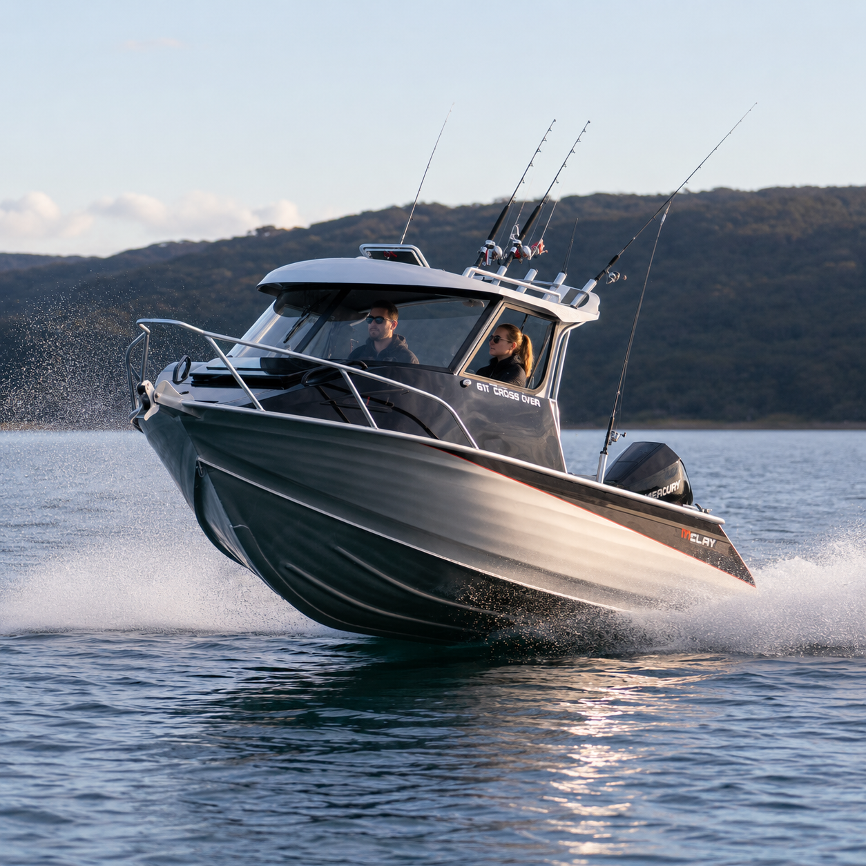 Mclay 611 CrossXover Hardtop planning on calm seas, Warren Hay Marine, whangarei 