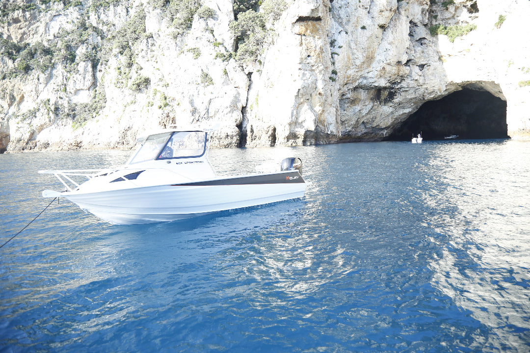 McLay 651 Sportsman alloy boat on trailer, featuring hard top and Yamaha outboard at Warren Hay Marine. Whangarei