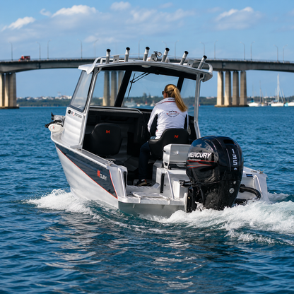 McLay Sportsman 591 HT on trailer powered by a Mercury outboard and ready for offshore fishing adventures.