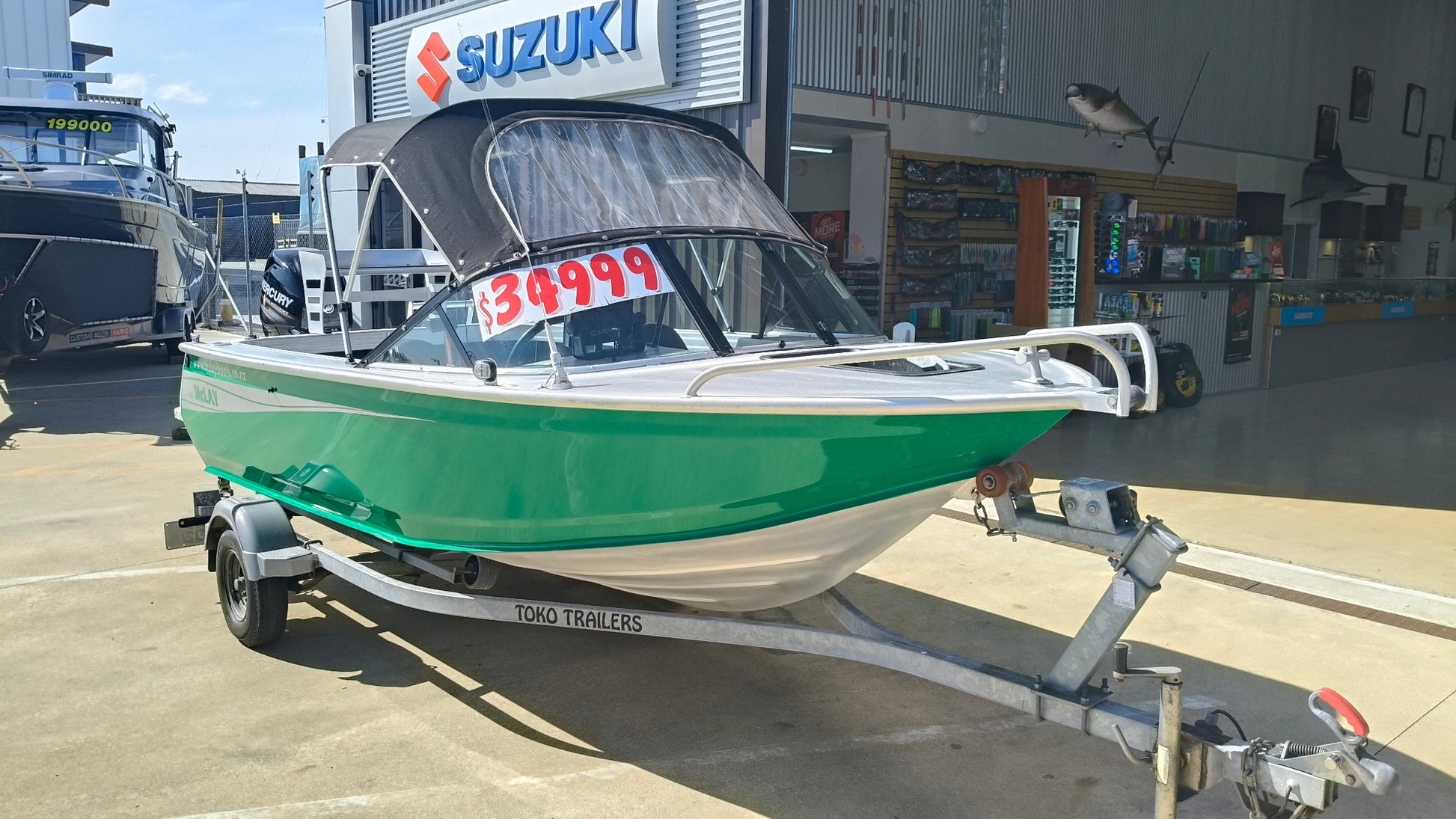 Near new low hour McLay 461, mercury 40hp outboard, toko Trailer ready to go for summer