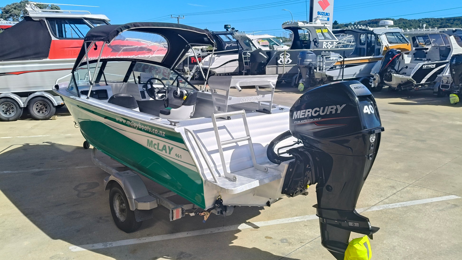 Near new low hour McLay 461, mercury 40hp outboard, toko Trailer ready to go for summer