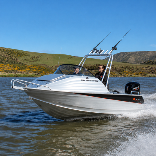 McLay 551 Sportsman underway showcasing New Zealand-built aluminium hull performance and family-friendly boating design.