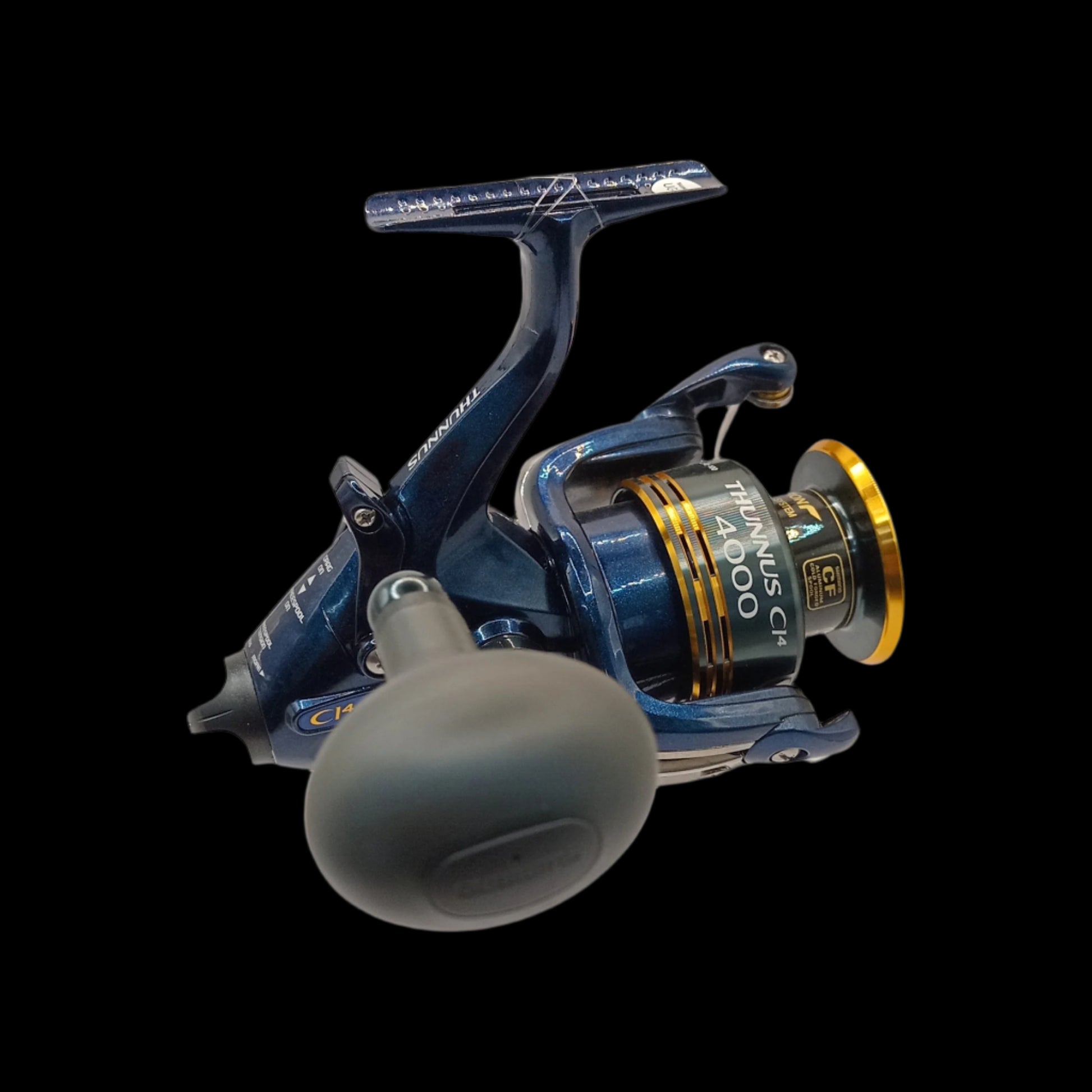 A Shimano Thunnus CI4 4000 spinning reel in blue and black color.