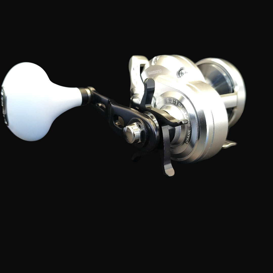 Shimano Trinidad 12A overhead fishing reel – compact high-performance saltwater reel with aluminium frame and smooth drag system.