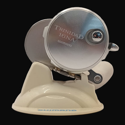 Shimano Trinidad 16NA overhead fishing reel – compact, high-speed saltwater reel with aluminium frame and Cross Carbon Drag system.