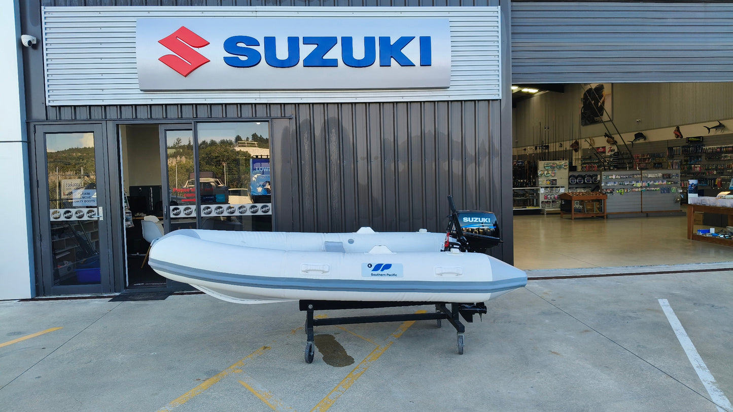 South Pacific SH310 RIB and suzuki DT15 2 stroke outboard. 
