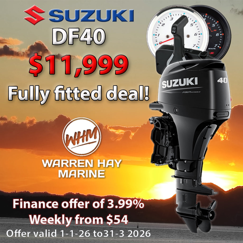 Suzuki outboard motor fully fitted to boat with controls, gauge, and propeller installed