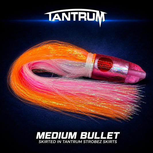 Tantrum medium bullet skirted in orange/pearl over pink game fishing lure