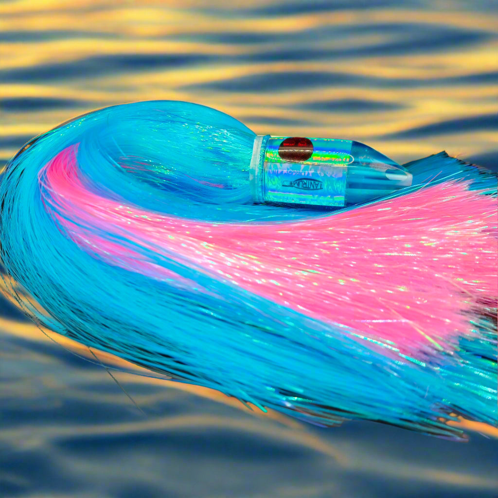 Tantrum Medium Jetpack LB lure with light blue head and pink/blue Strobez skirts – available at Warren Hay Marine.