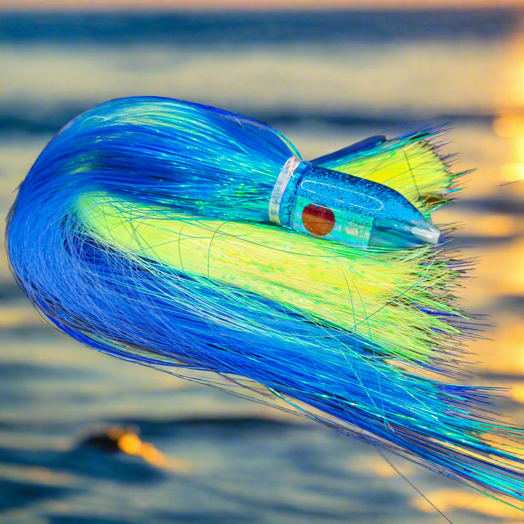 Tantrum Medium Jetpack lure skirted with vibrant Strobez skirts – available at Warren Hay Marine, Whangarei.