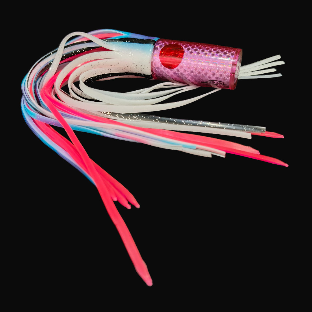 Tantrum Medium AMN game lure with pink head and Blue Ocean skirts in blue white over pink Tough Tails.