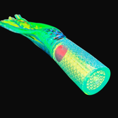 Tantrum Medium AMN trolling lure with lumo over blue green blue ocean rubber skirts