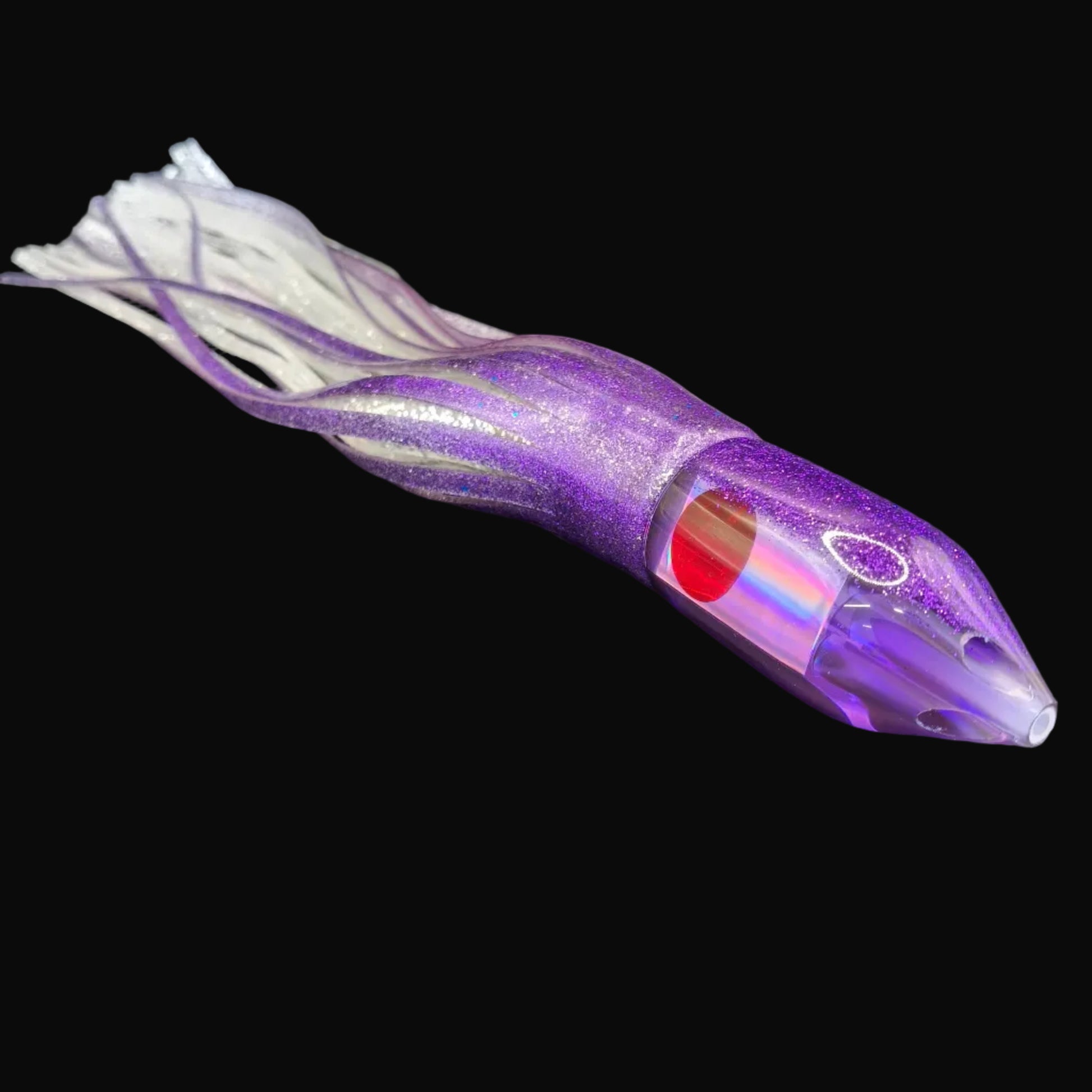 Tantrum Medium Jetpack lure with purple head and purple, silver, and Blue Ocean skirts, 350mm.
