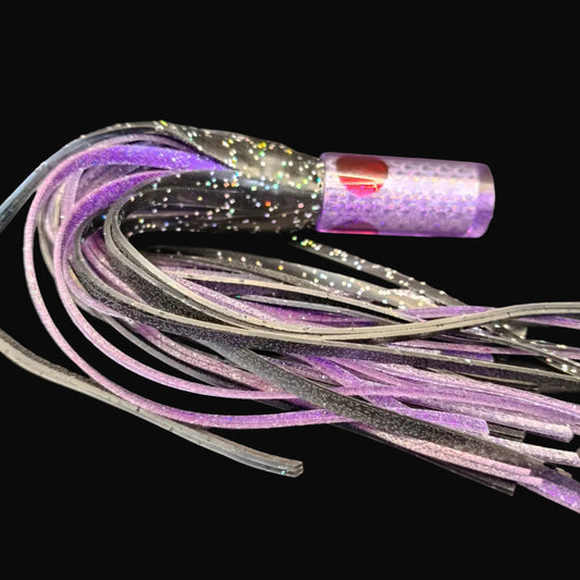 Tantrum Small AMN lure with purple head and BlueOcean black over purple skirts, 270mm.