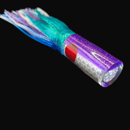 Tantrum Small AMN lure with purple head and BlueOcean green, purple, and blue skirts, 220mm. game fishing lure