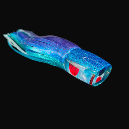 Tantrum Small Bandit LB Pelagic trolling lure with blue/mint head and blue/green ocean skirts.