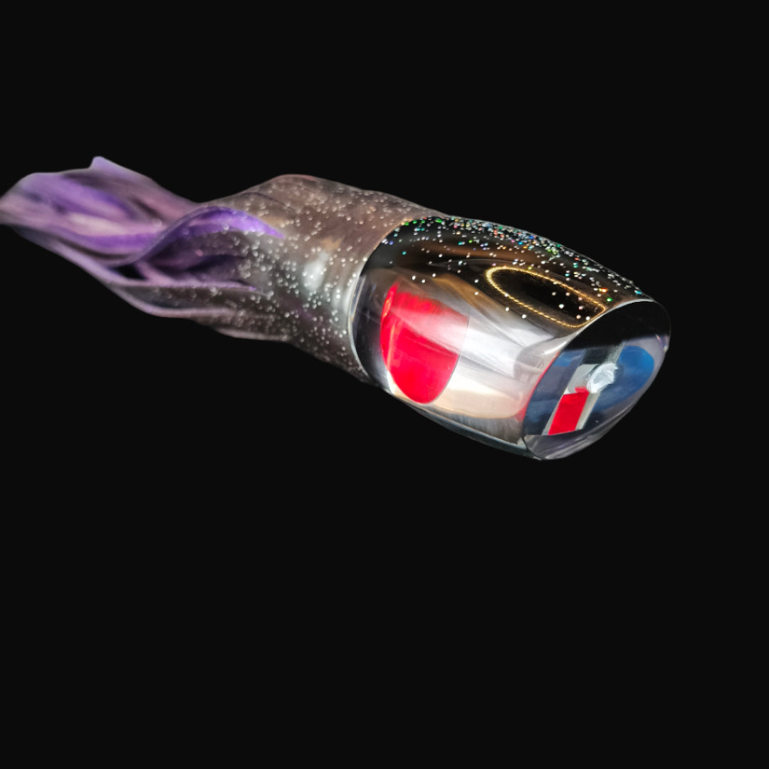 Tantrum Medium Bandit fishing lure – black head with purple-black rubber and ocean blue skirts