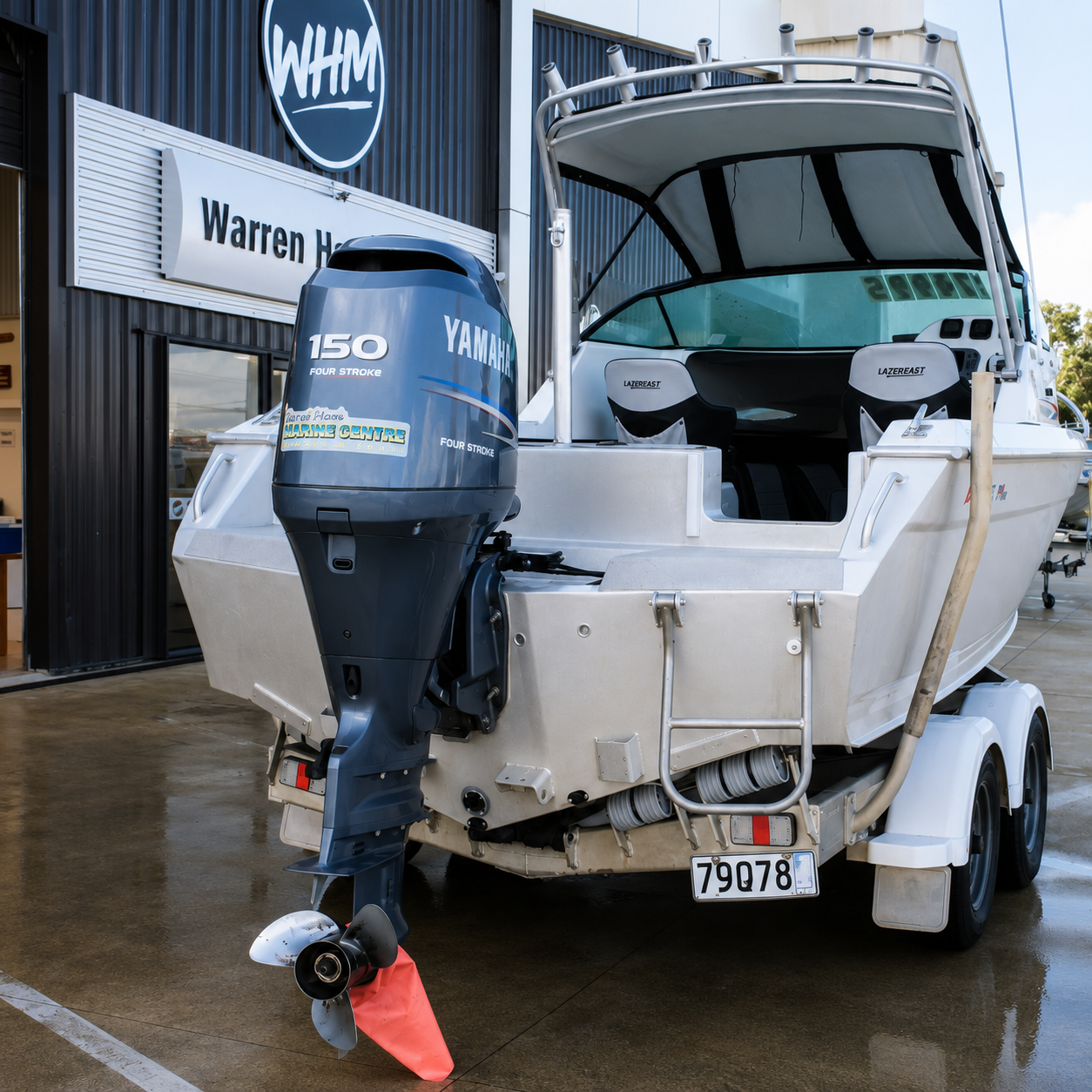 Yamaha F150 FourStroke outboard mounted on the transom of the 2005 Lazercraft 621XP.
