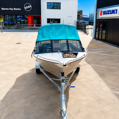 Used boat, 2006 Marco 480 Blazer aluminium runabout with Mercury 50hp two-stroke outboard on galvanised trailer, front view at Warren Hay Marine Whangārei.