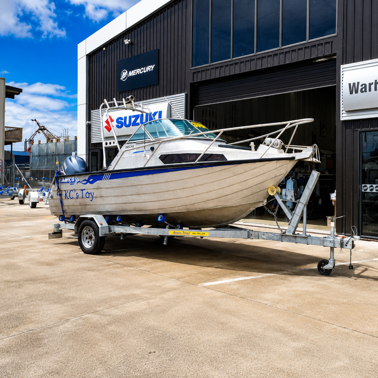 Front port view of the Ramco Fishmaster 580 highlighting the bow rails, cuddy cabin and Yamaha-powered fishing package