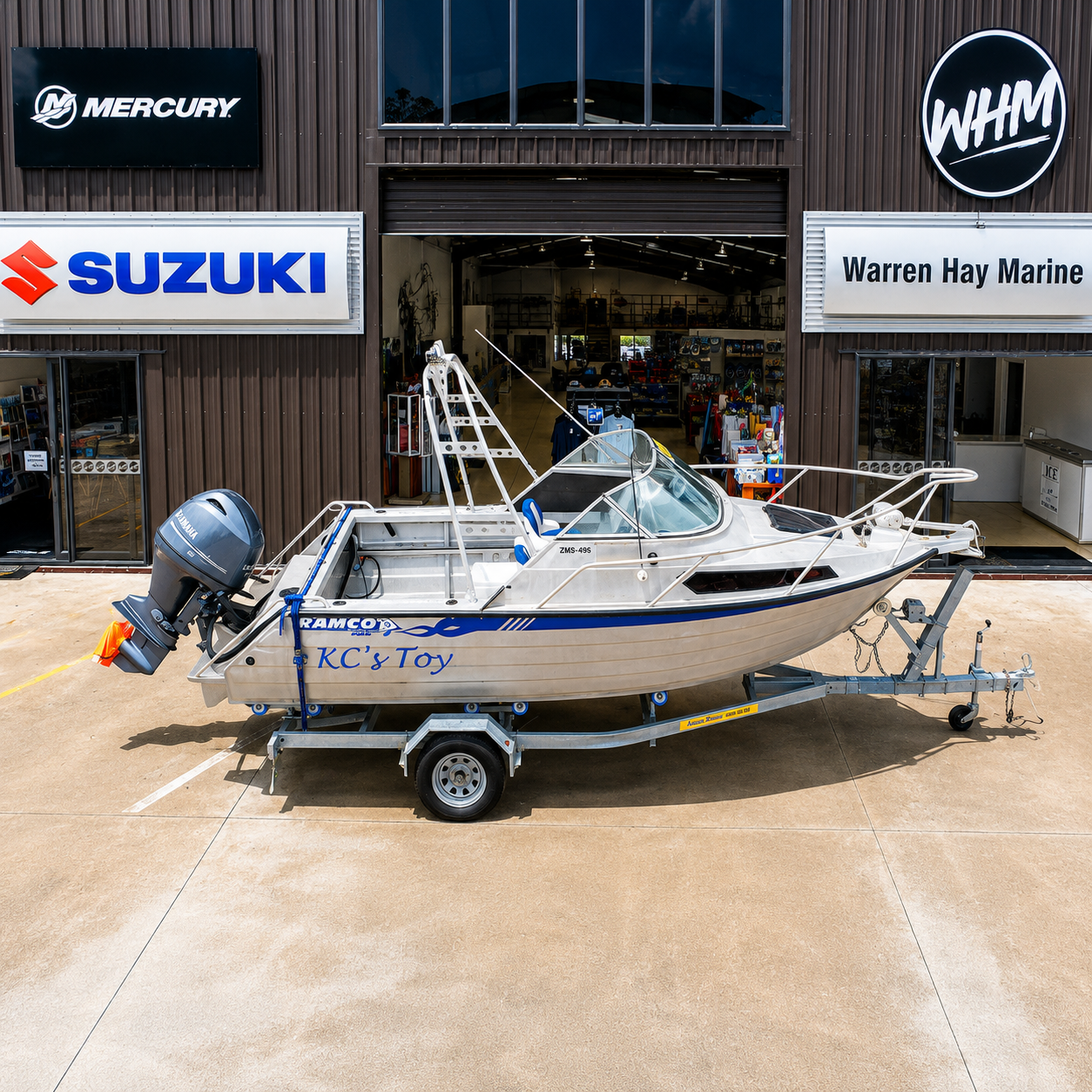 Elevated view of the Ramco Fishmaster 580 showcasing the complete fishing package on its galvanised trailer outside Warren Hay Marine.