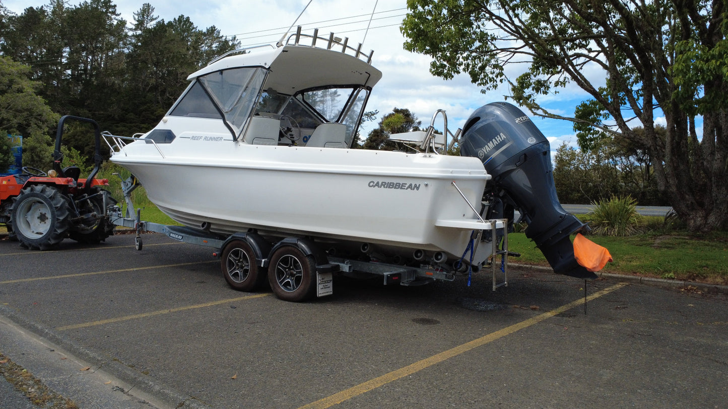 Caribbean C21 Reef Runner on Mackay trailer – port side view