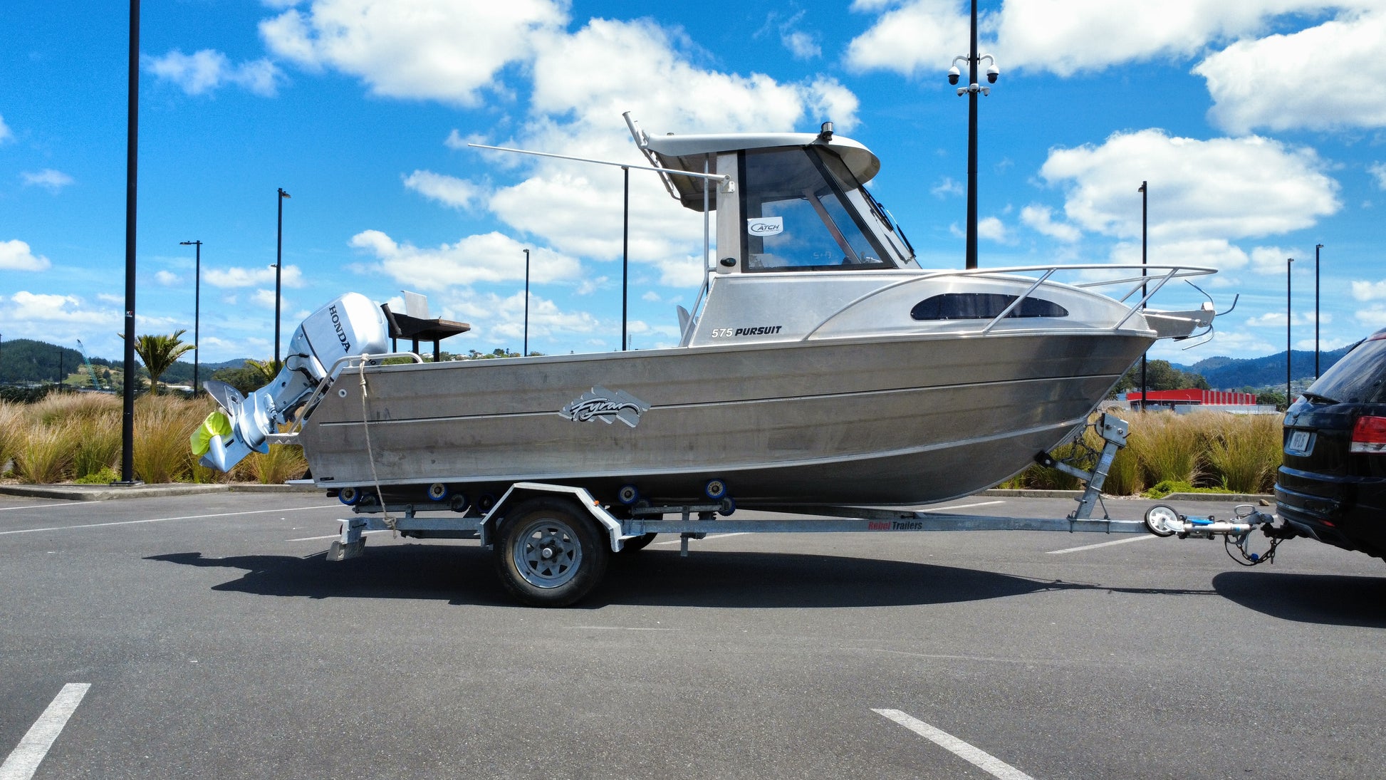 Used boat for sale, Fyren 575 Pursuit hard top, 90hp honda, single axle Galvanised trailer. 