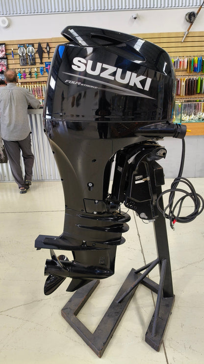 Suzuki DF100 4-stroke outboard 25 inch shaft ex demonstrator low hours, gauges, remote and cables included