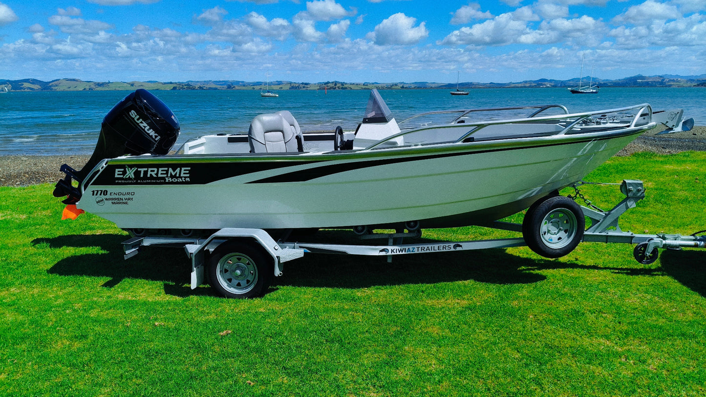 Extreme Enduro 1770 alloy fishing boat powered by Suzuki DF100 with large casting deck and trailer.