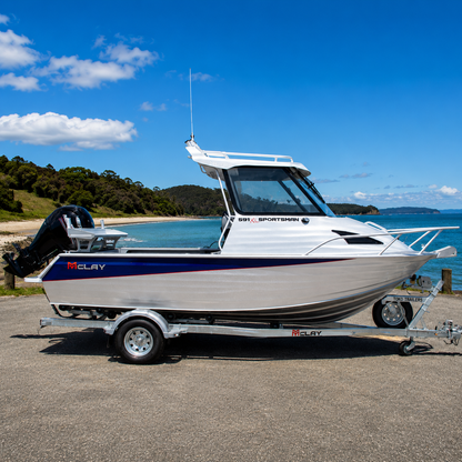 The McLay Sportsman 591 HT combines offshore capability, hardtop protection, and a spacious fishing cockpit. Built for New Zealand conditions and available from Warren Hay Marine.