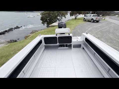 McLay 651 Sportsman alloy boat on trailer, featuring hard top and Yamaha outboard at Warren Hay Marine. Whangarei