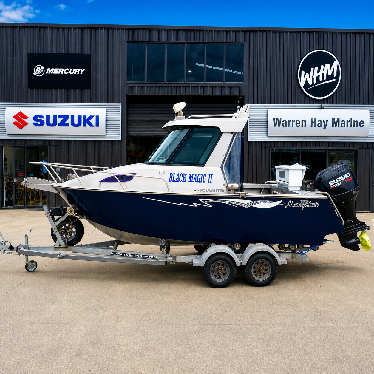 Used boats, Port side view of a 2018 Marco 600 Sou'Wester Hard Top with Suzuki BF140 four-stroke outboard on an Ultra Trailers tandem axle trailer at Warren Hay Marine, Whangārei.